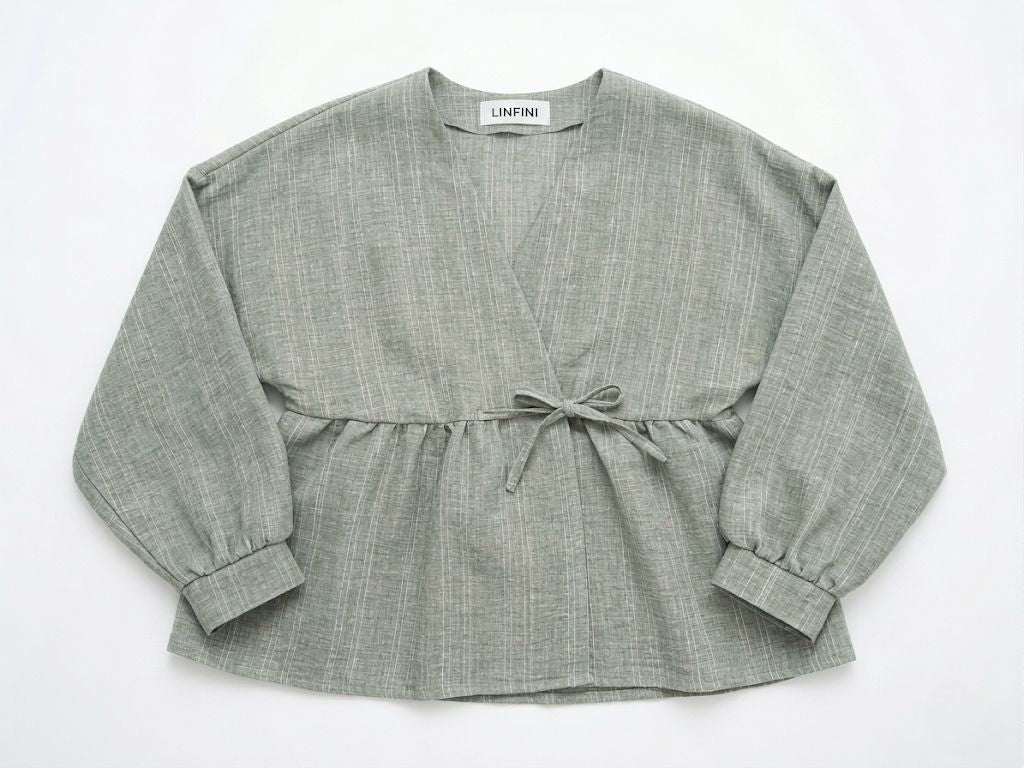 Groene wikkelblouse met strikdetail – Luchtige damesblouse